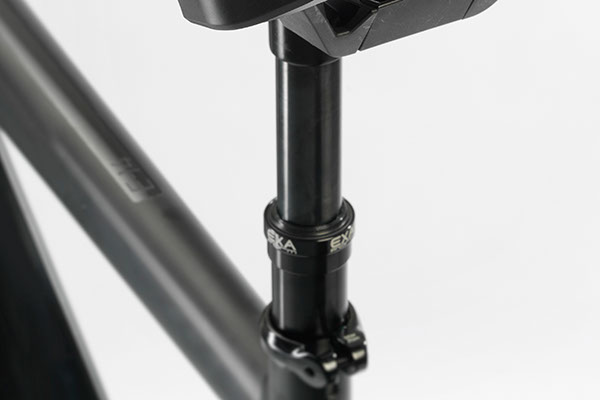 Suspension seat post with dropper function